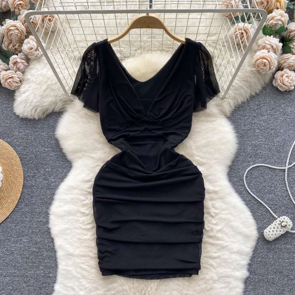 Nightclub womens clothing design sense dress female mind machine perspective hollowed out pleated slim fit short sexy buttocks wrapped skirt trend