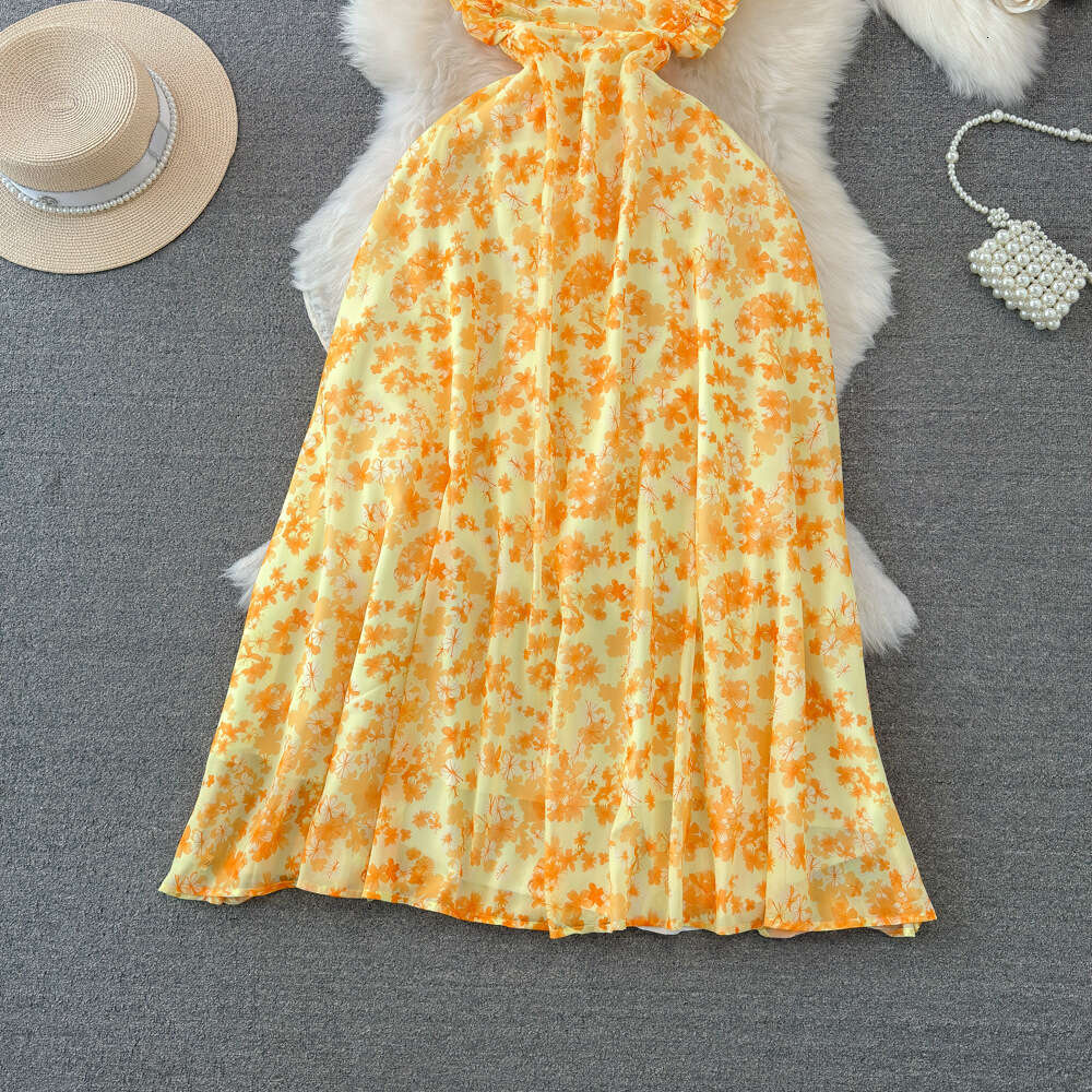 Beach resort style yellow floral dress summer fashion waist tightening slimming effect A-line backless strapless long dress