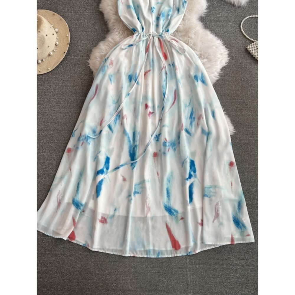 Gentle and socialite temperament slim waist mid length A-line printed strap dress seaside vacation beach skirt