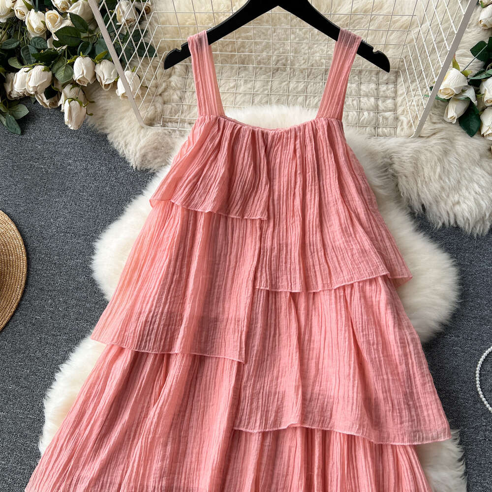 Korean holiday wear with a lazy design and irregular ruffled edges loose and slimming mid length suspender dress