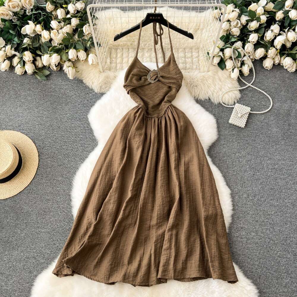 Tea break French style dress with a feminine feel backless hanging neck slim fit medium length travel photo vacation dress elegant bottom skirt