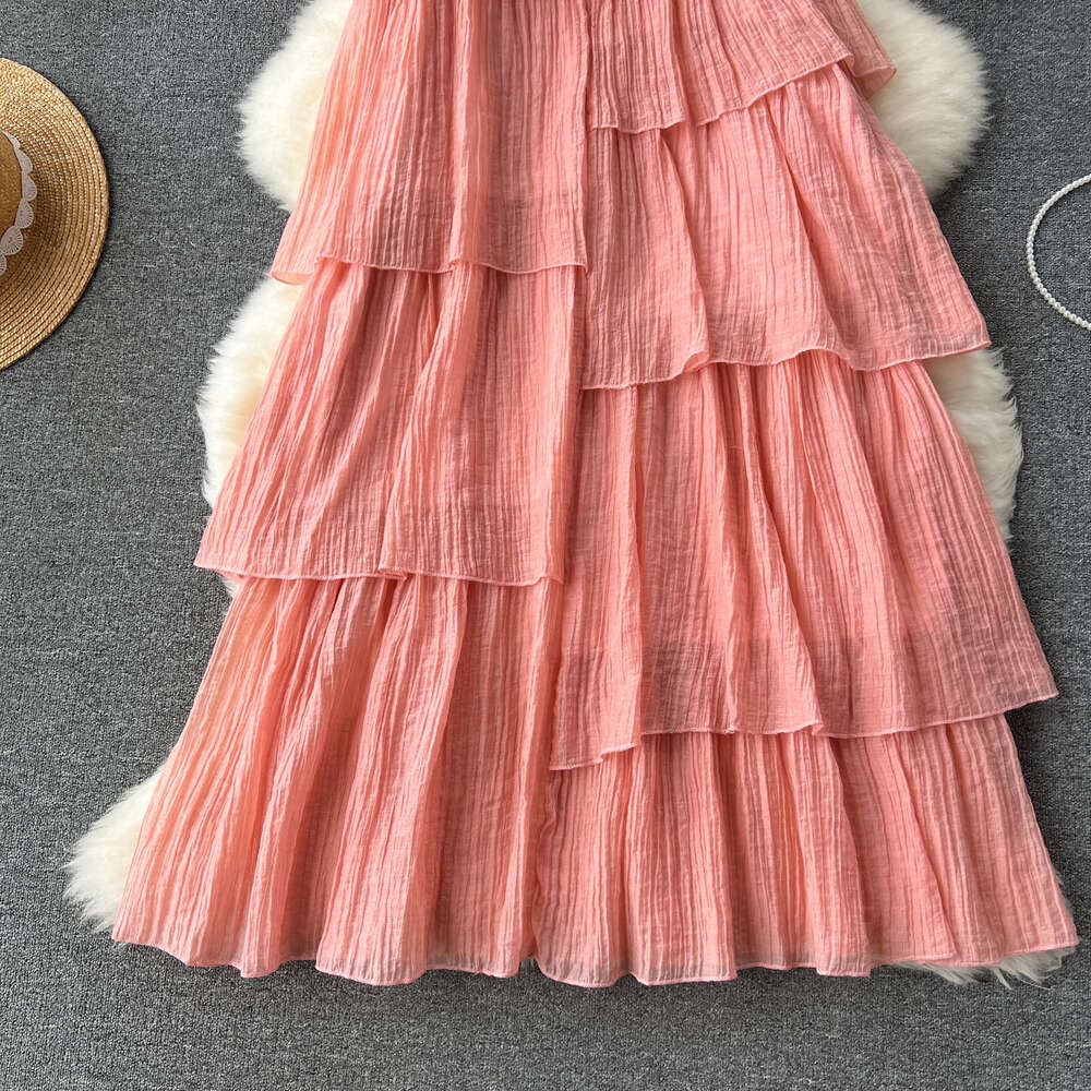 Korean holiday wear with a lazy design and irregular ruffled edges loose and slimming mid length suspender dress