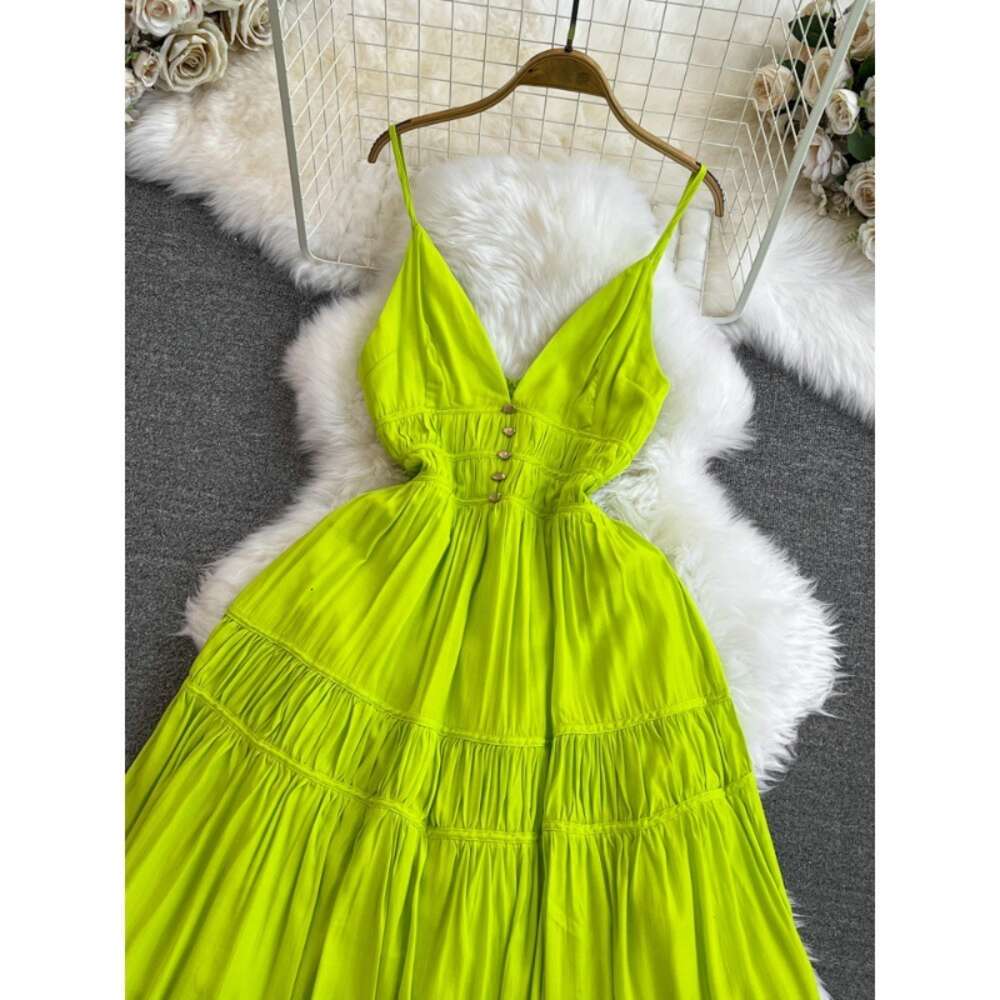 High end and socialite temperament V-neck backless waist cinched slimming A-line suspender dress seaside vacation big hem long skirt