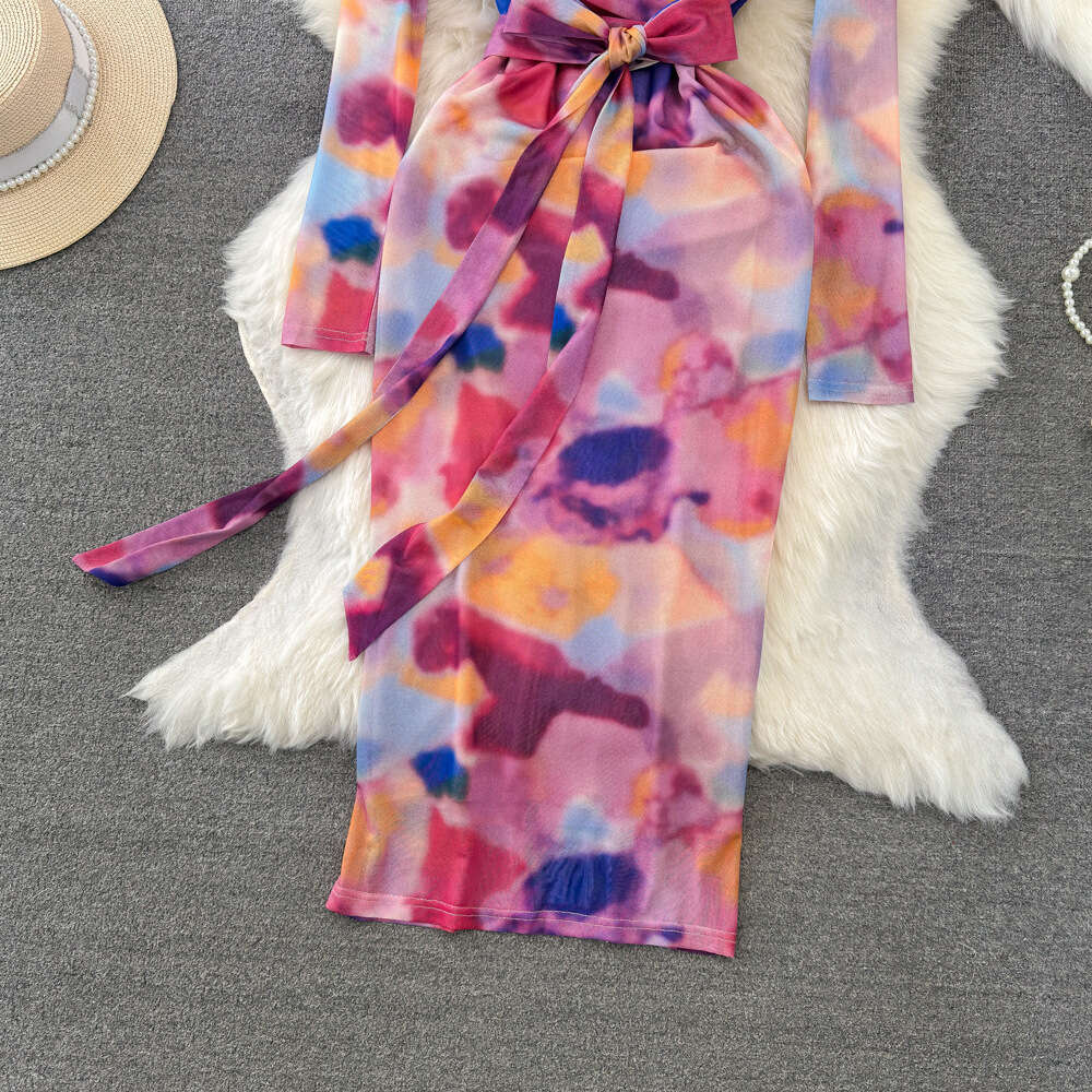 Feminine and socialite temperament long sleeved V-neck waist cinching slimming medium length buttocks wrapped mesh printed bottom dress spring