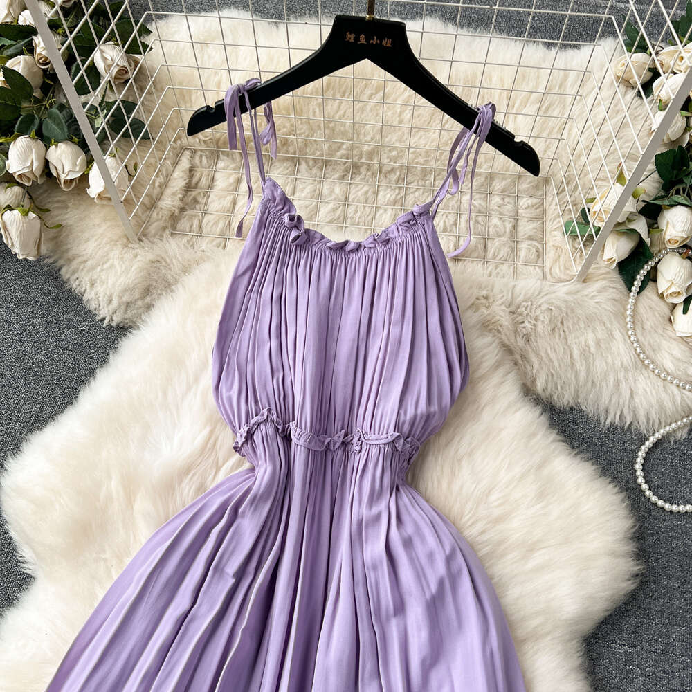 Purple dress for women in summer 2024 new seaside vacation travel photo taking and wearing high-end camisole fairy dress