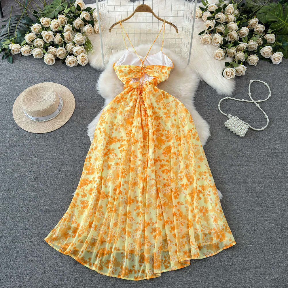 Beach resort style yellow floral dress summer fashion waist tightening slimming effect A-line backless strapless long dress