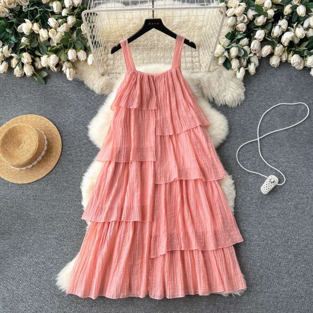 Korean holiday wear with a lazy design and irregular ruffled edges loose and slimming mid length suspender dress