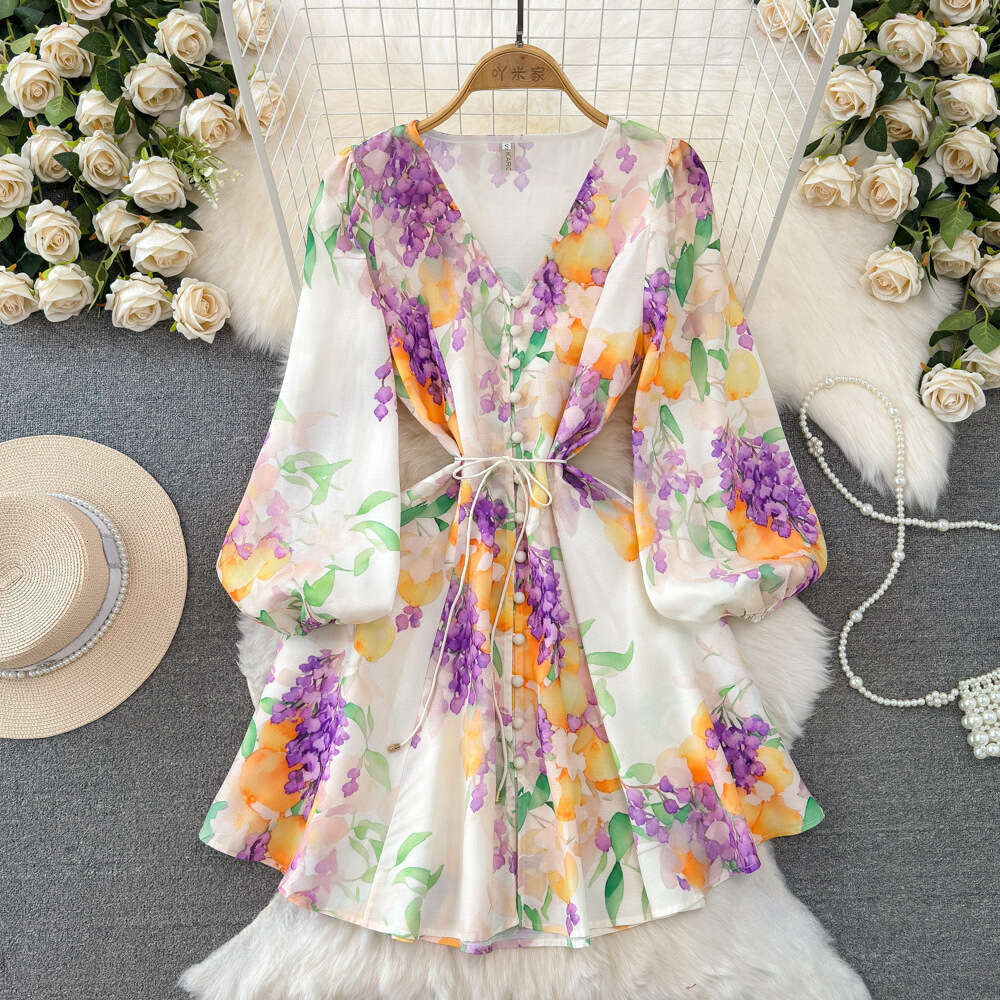 Spring and autumn design sense socialite temperament lantern long sleeved V-neck waistband slimming effect single breasted A-line printed dress for wo