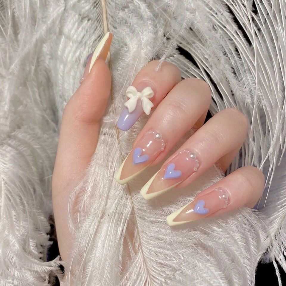 Girls False Nails French Love Bow Phototherapy Nail Patch Gentle and Pure Desire Handmade Wearing Armor Straight High end Small and Popular 240530