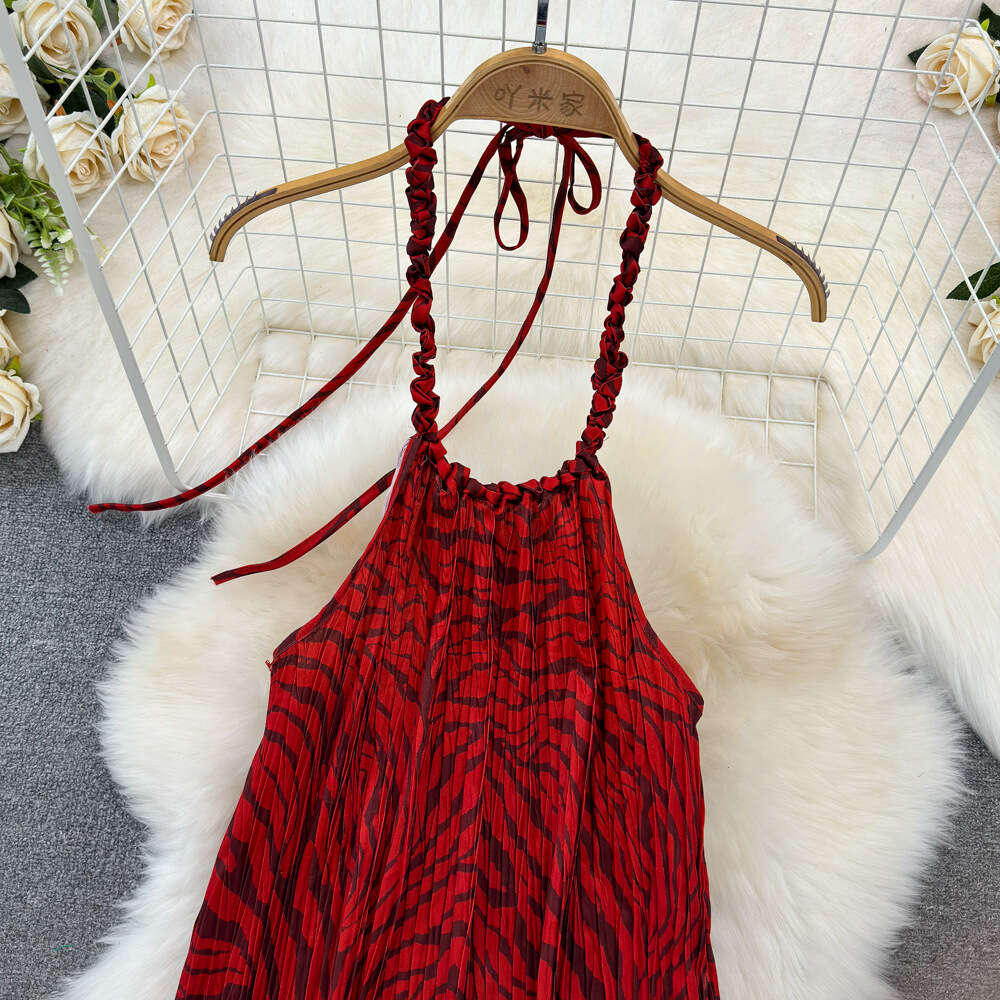 Fashionable seaside vacation neck hanging backless loose fitting mid length A-line printed dress for travel wear camisole long dress