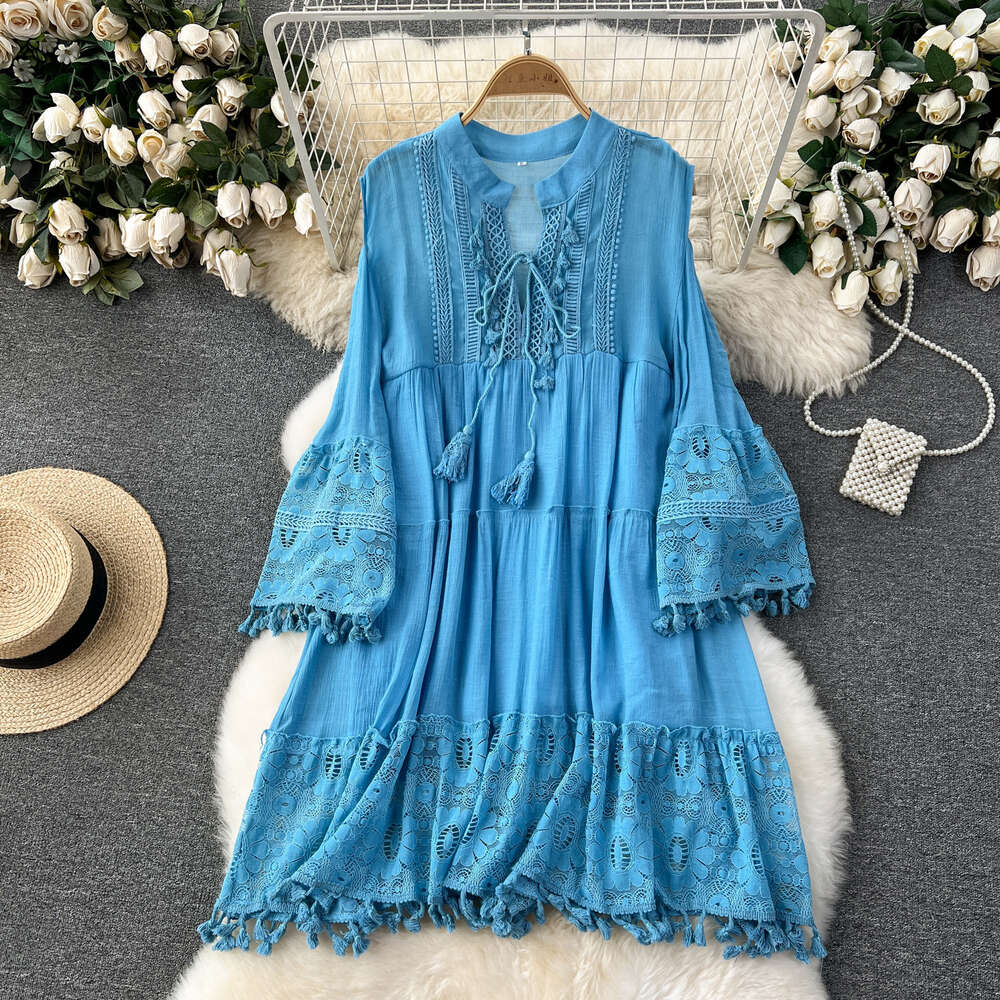 Korean style early spring vacation dress for women with a design sense of hollowed out flared sleeves tassels loose and slimming lace skirt