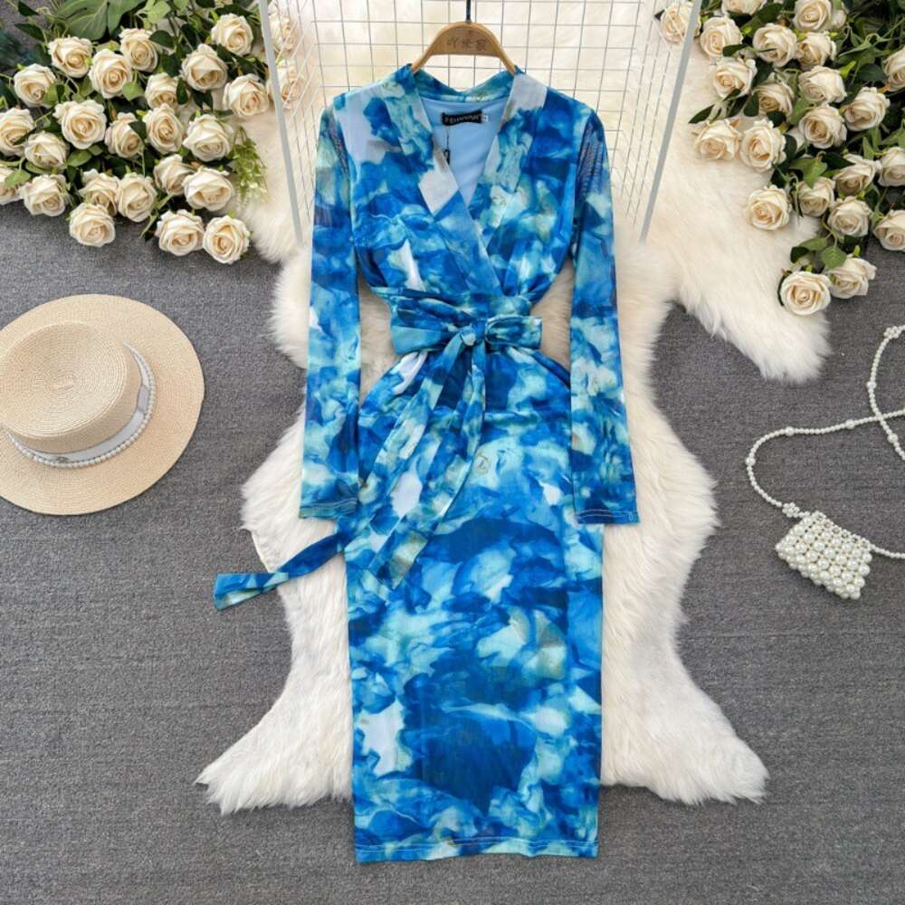 Feminine and socialite temperament long sleeved V-neck with waistband and slimming effect medium length halo dyed printed buttocks wrapped bottom dres