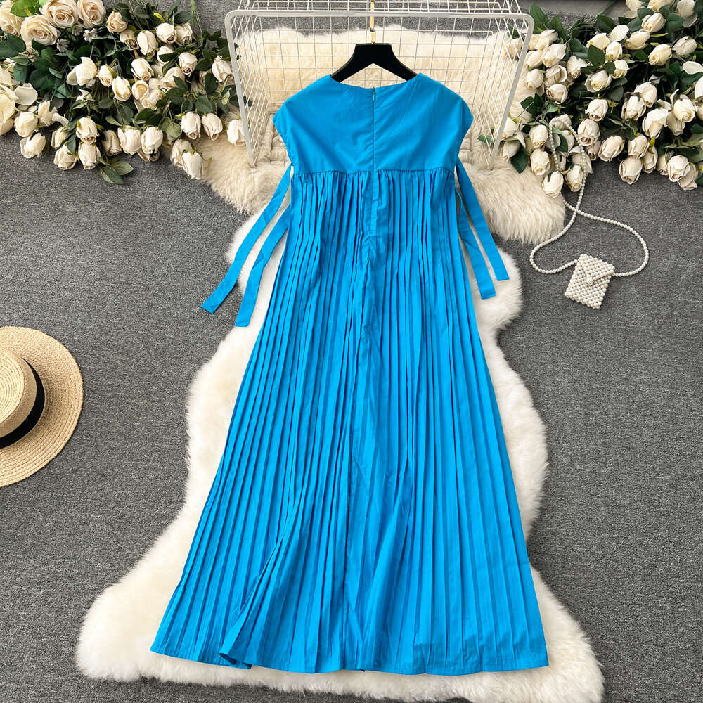 French dress for women with a high-end feel revealing a white blue loose fit and slimming effect. Mid length lazy style vacation dress tank top skirt