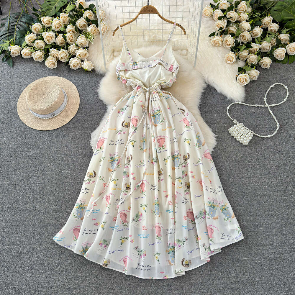 Beach resort style V-neck waist slimming mid length A-line suspender dress fashionable and elegant temperament long skirt in summer