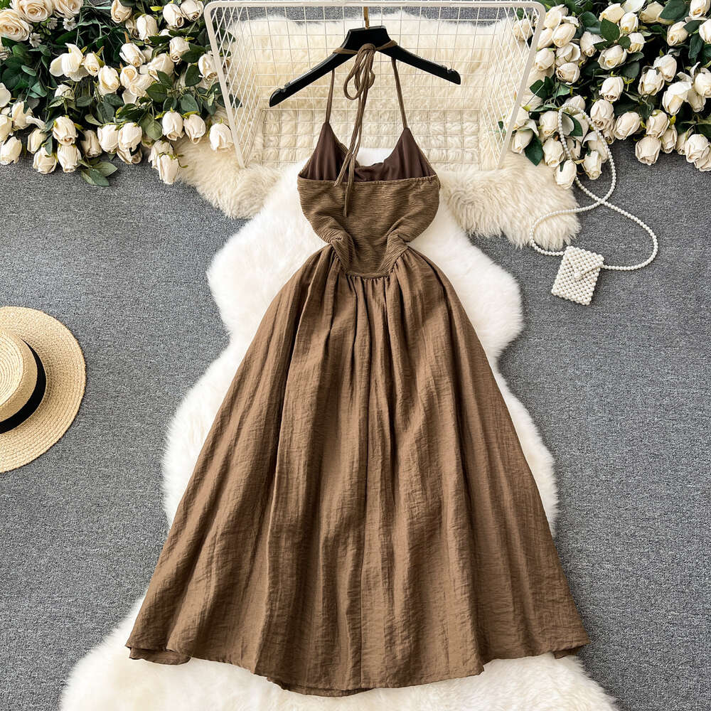 Tea break French style dress with a feminine feel backless hanging neck slim fit medium length travel photo vacation dress elegant bottom skirt