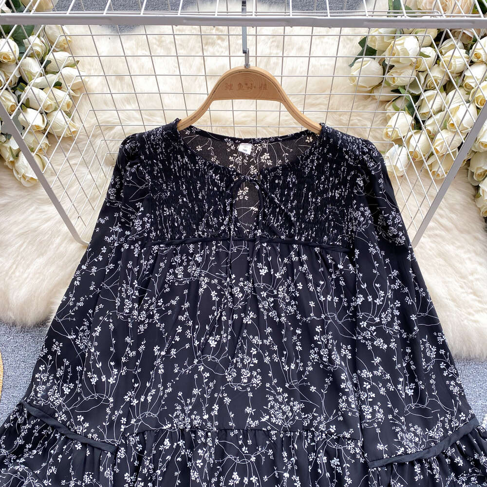 Korean style outfit with age reducing bubble sleeves floral camisole skirt loose and slimming doll skirt early spring dress womens trend
