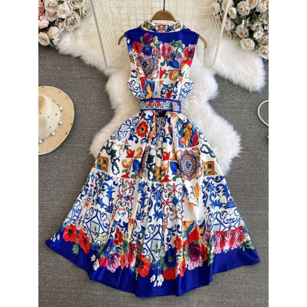 High end light luxury socialite temperament sleeveless V-neck waistband slimming effect mid length version A-line positioning printed dress dress