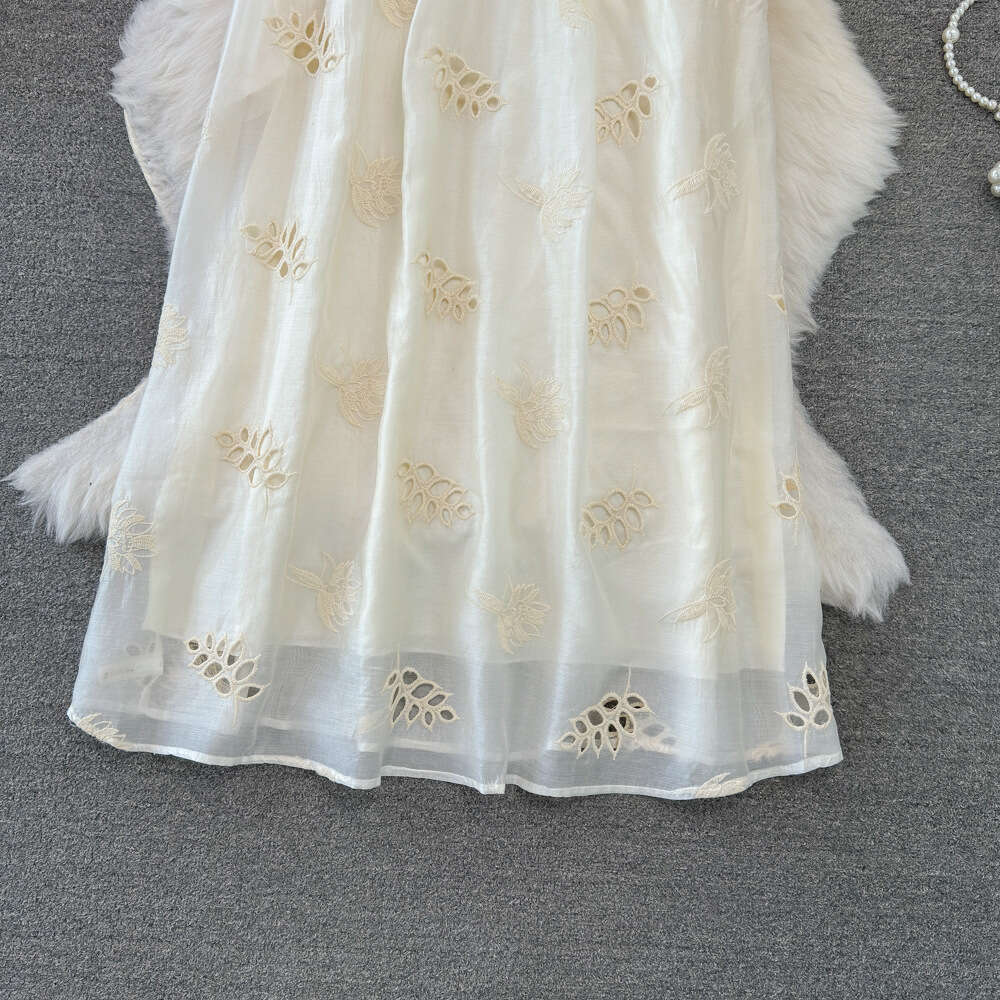Fashionable and gentle style socialite temperament hanging neck off shoulder loose A-line embroidered dress seaside vacation long dress summer