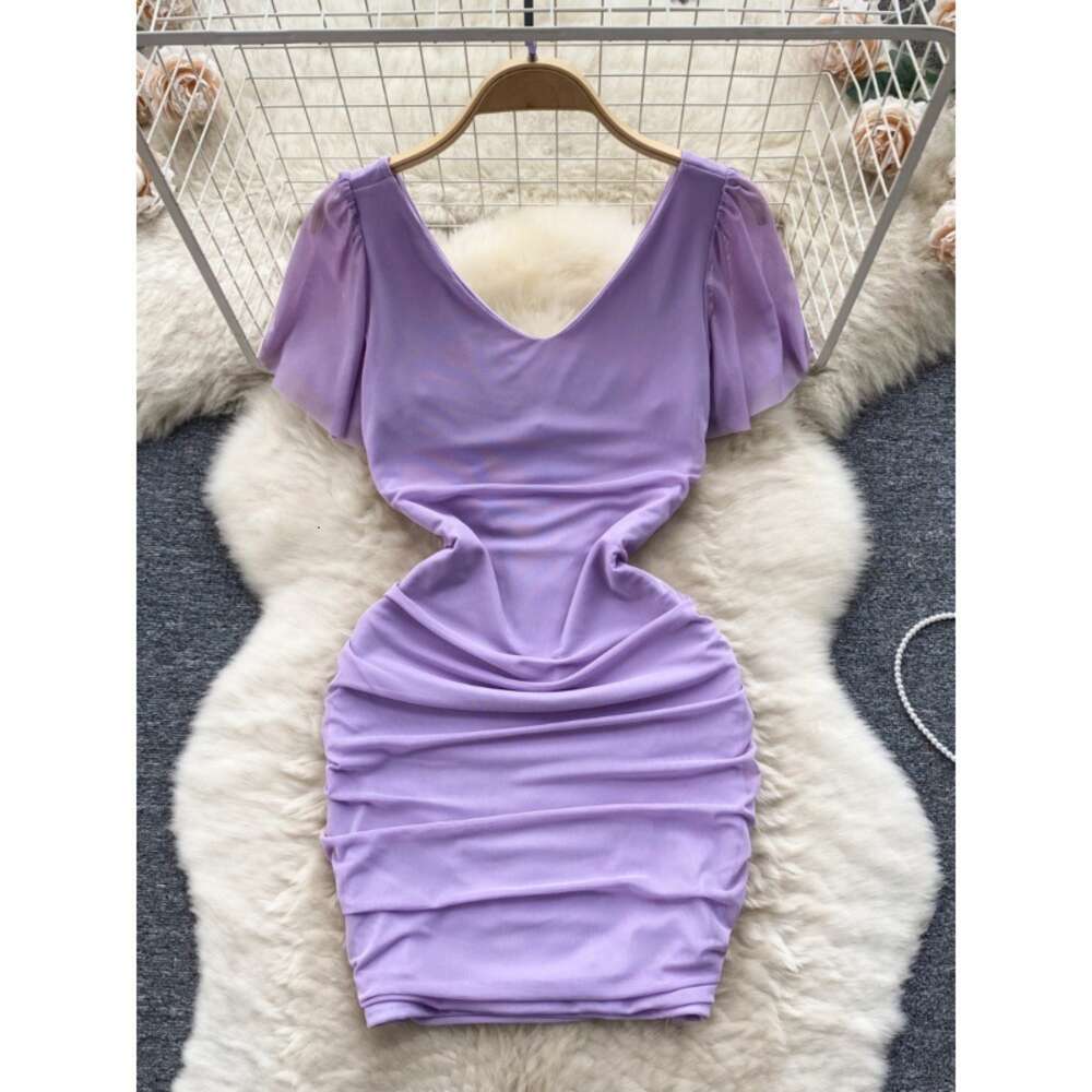 Nightclub womens clothing design sense dress female mind machine perspective hollowed out pleated slim fit short sexy buttocks wrapped skirt trend