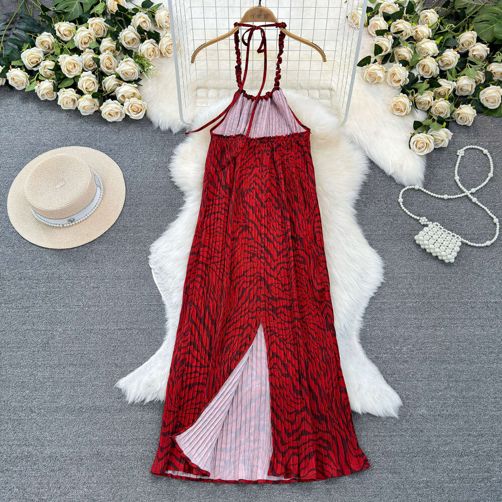 Fashionable seaside vacation neck hanging backless loose fitting mid length A-line printed dress for travel wear camisole long dress