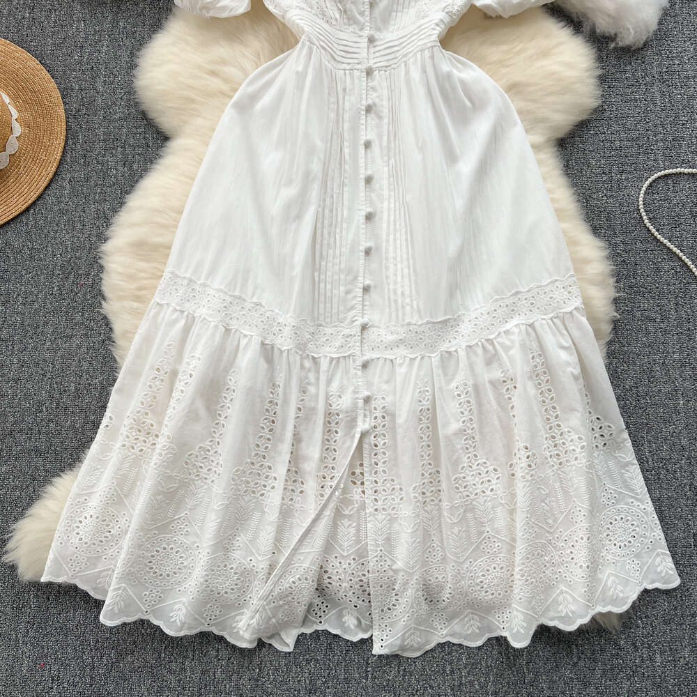 French dress for women in 2024 new temperament V-neck buckle slim fit medium length age reducing bubble sleeve first love dress