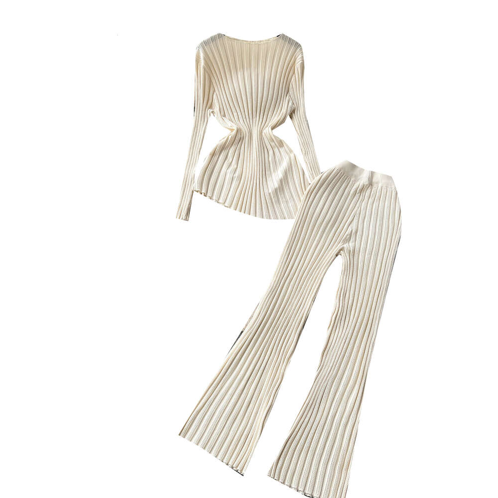 Fashion Set Feminine Style Age Reducing Stripe Knitted Irregular Top Elastic Waist Elastic Wide Leg Pants Fashion