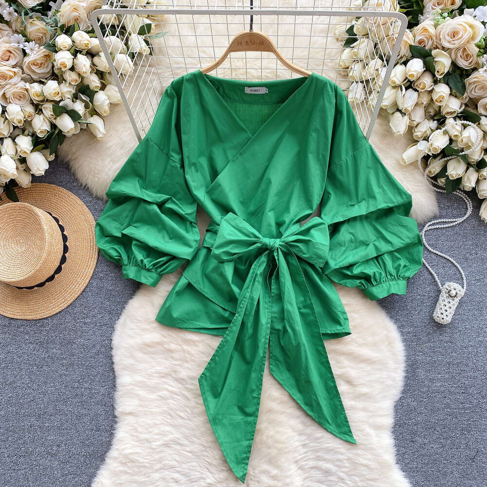 European style shirt for women with a design feel bubble sleeves with straps that wrap around the waist for a slimming look Vneckf ashionables pringo 