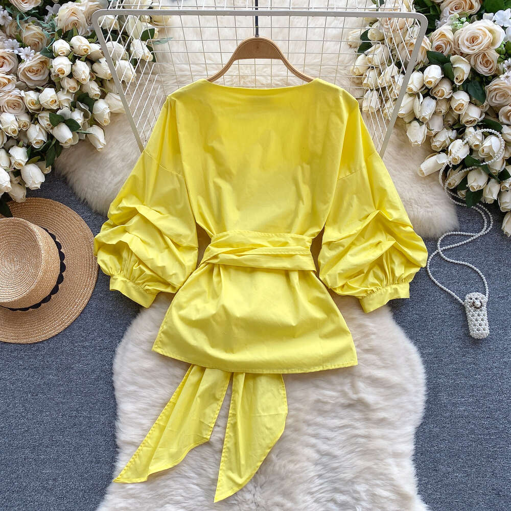 European style shirt for women with a design feel bubble sleeves with straps that wrap around the waist for a slimming look Vneckf ashionables pringo 