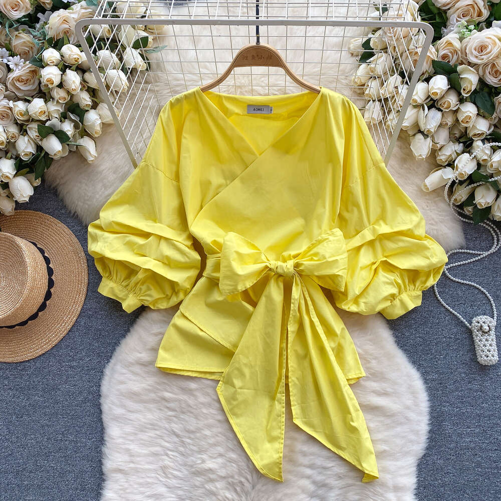 European style shirt for women with a design feel bubble sleeves with straps that wrap around the waist for a slimming look Vneckf ashionables pringo 