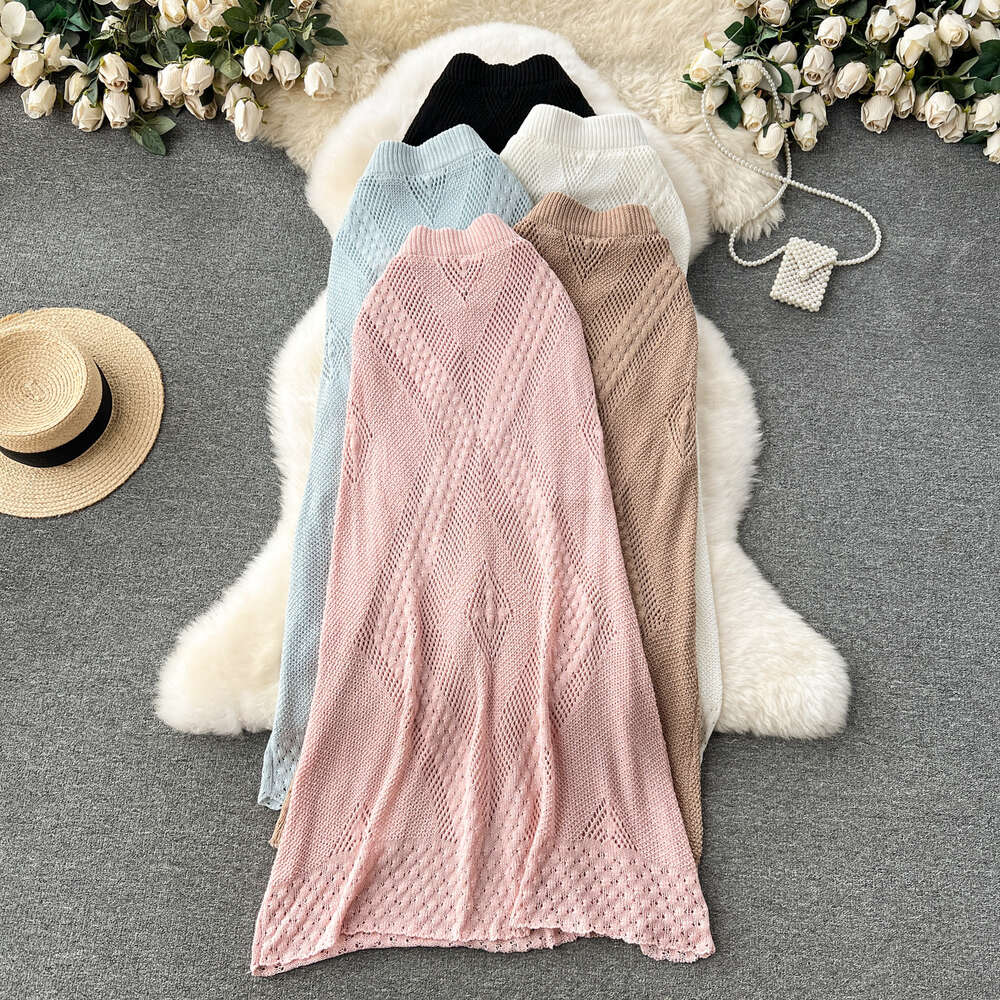 Design inspired hollowed out diamond grid skirt for women high waisted and slim knit A-line skirt with a gentle and trendy drape