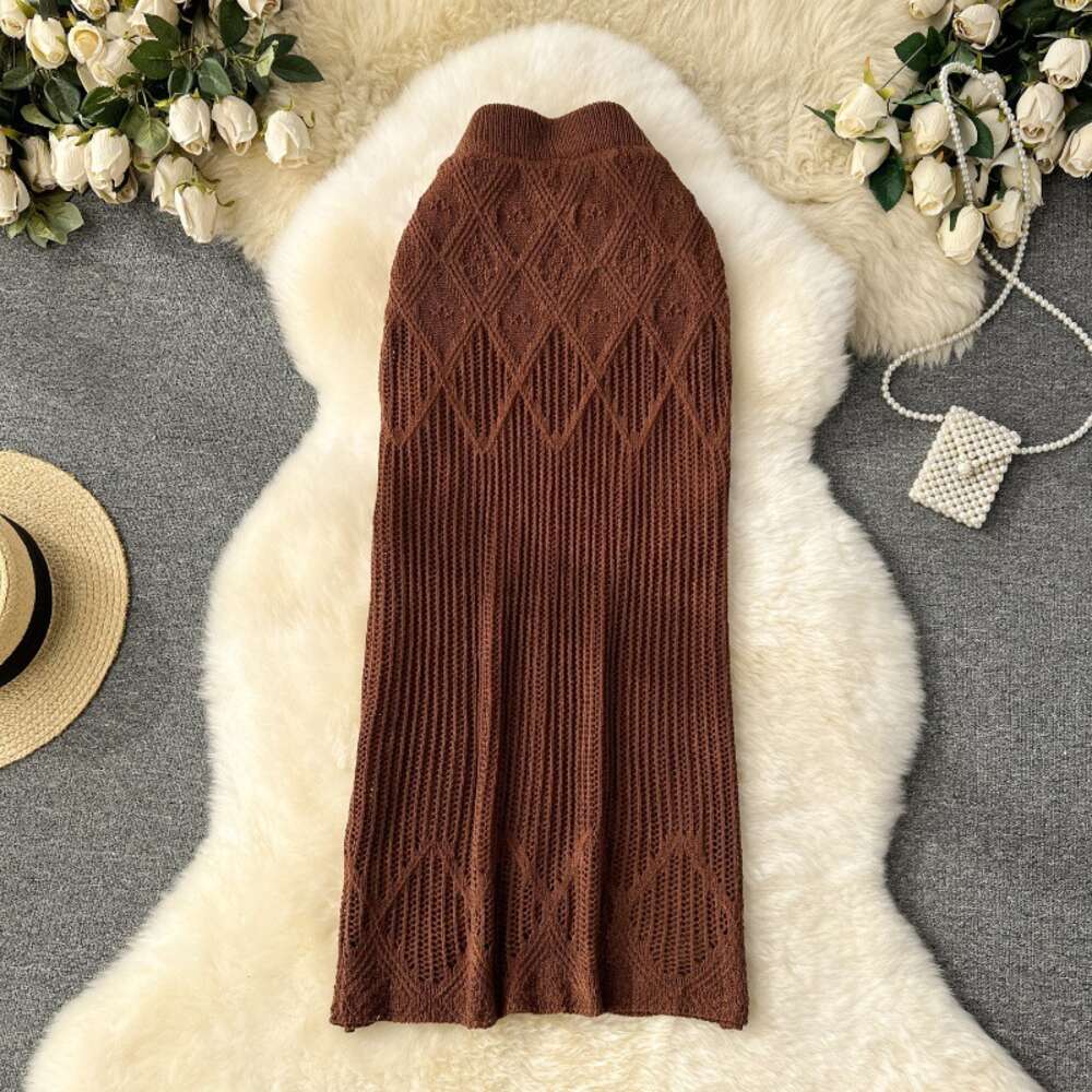 Korean version of womens clothing design with diamond grid hollow knit skirt womens high waisted and slim mid length solid color buttocks wrapped skir