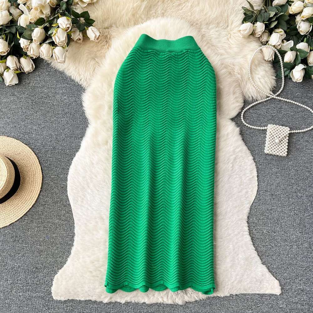 Candy colored sweater skirt with a luxurious texture 2023 new high waisted versatile mid length wave patterned skirt for women