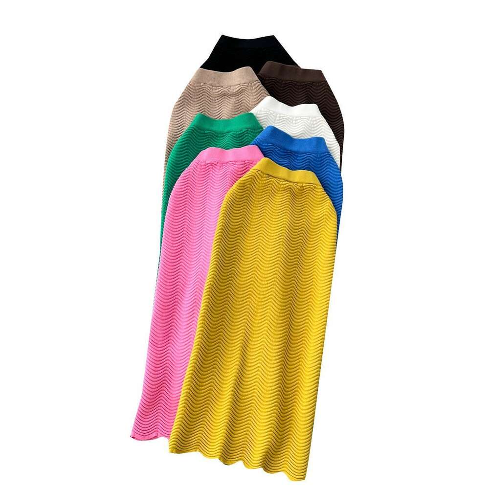 Candy colored sweater skirt with a luxurious texture 2023 new high waisted versatile mid length wave patterned skirt for women