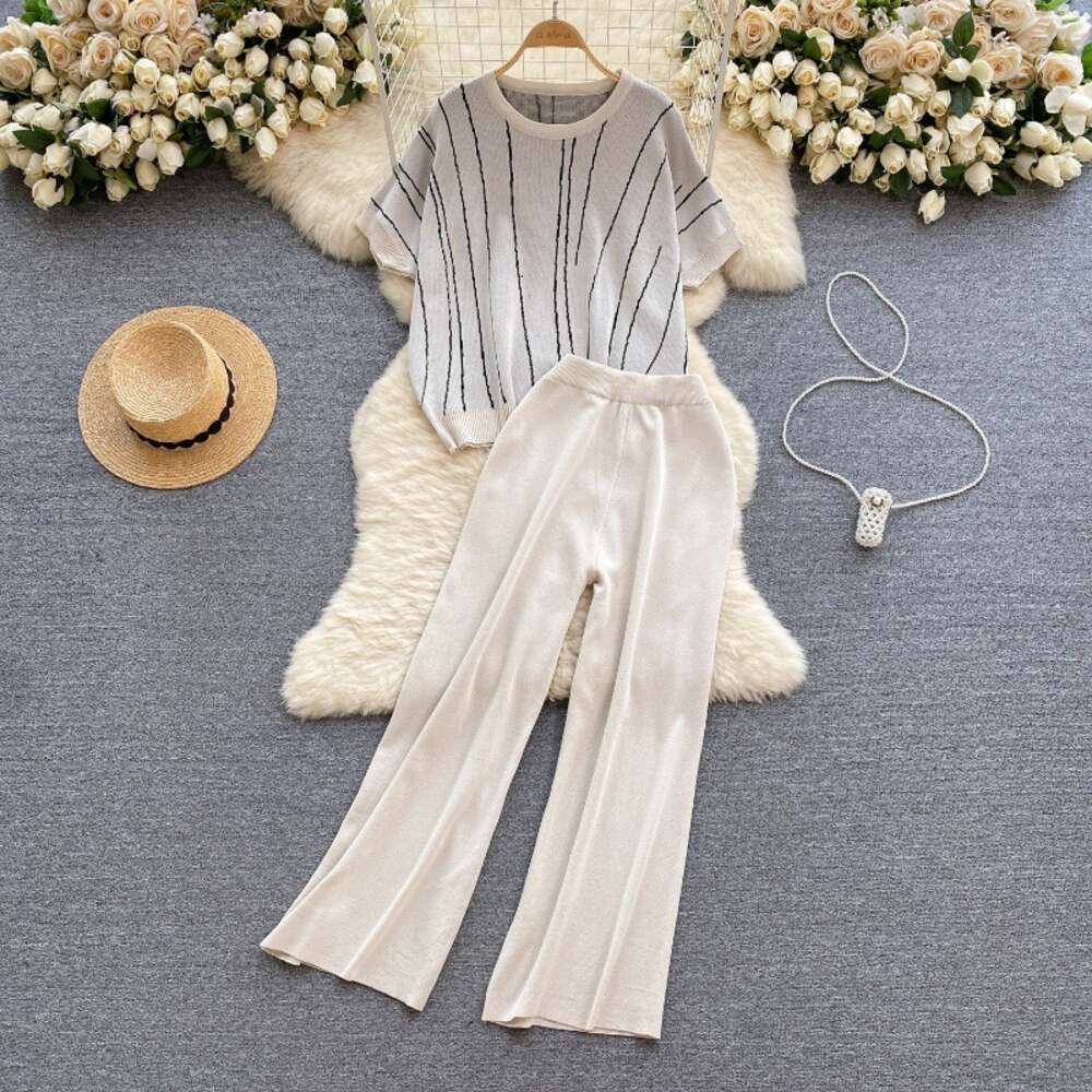 Korean version of womens clothing design with striped knit top loose coverage slimming effect high waisted wide leg pants fashionable two-piece set
