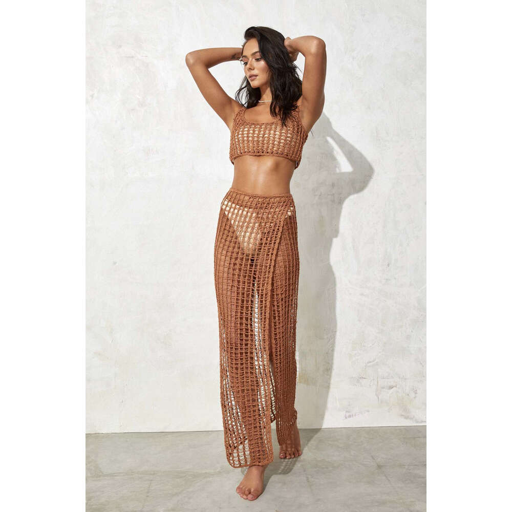 Womens hollowed out short style exposed navel knitted sweater vest with slit sexy perspective beach long skirt knitted set