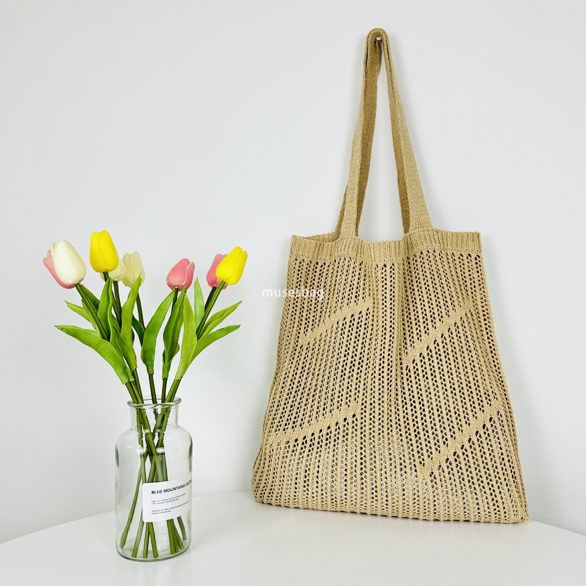 New minimalist and stylish portable bag knitted bag hollowed out bag single shoulder bag large capacity tote bag beach bag women's bag trend