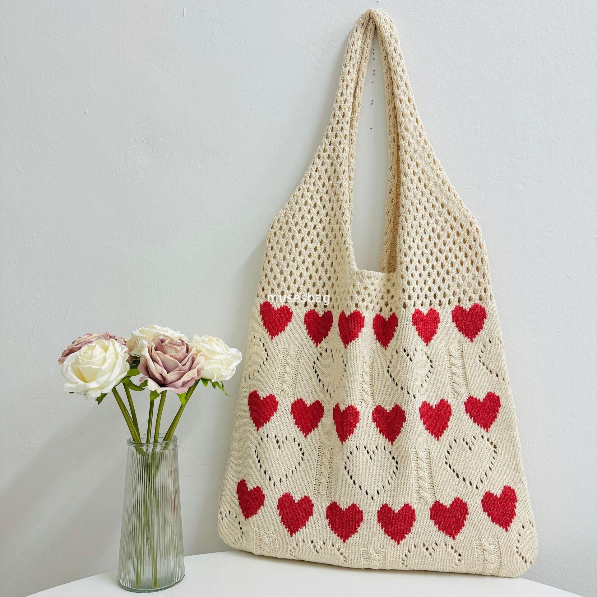 New Instagram hollowed out design bag summer hot selling knitted bag love pattern bag large capacity woven bag beach bag shopping bag