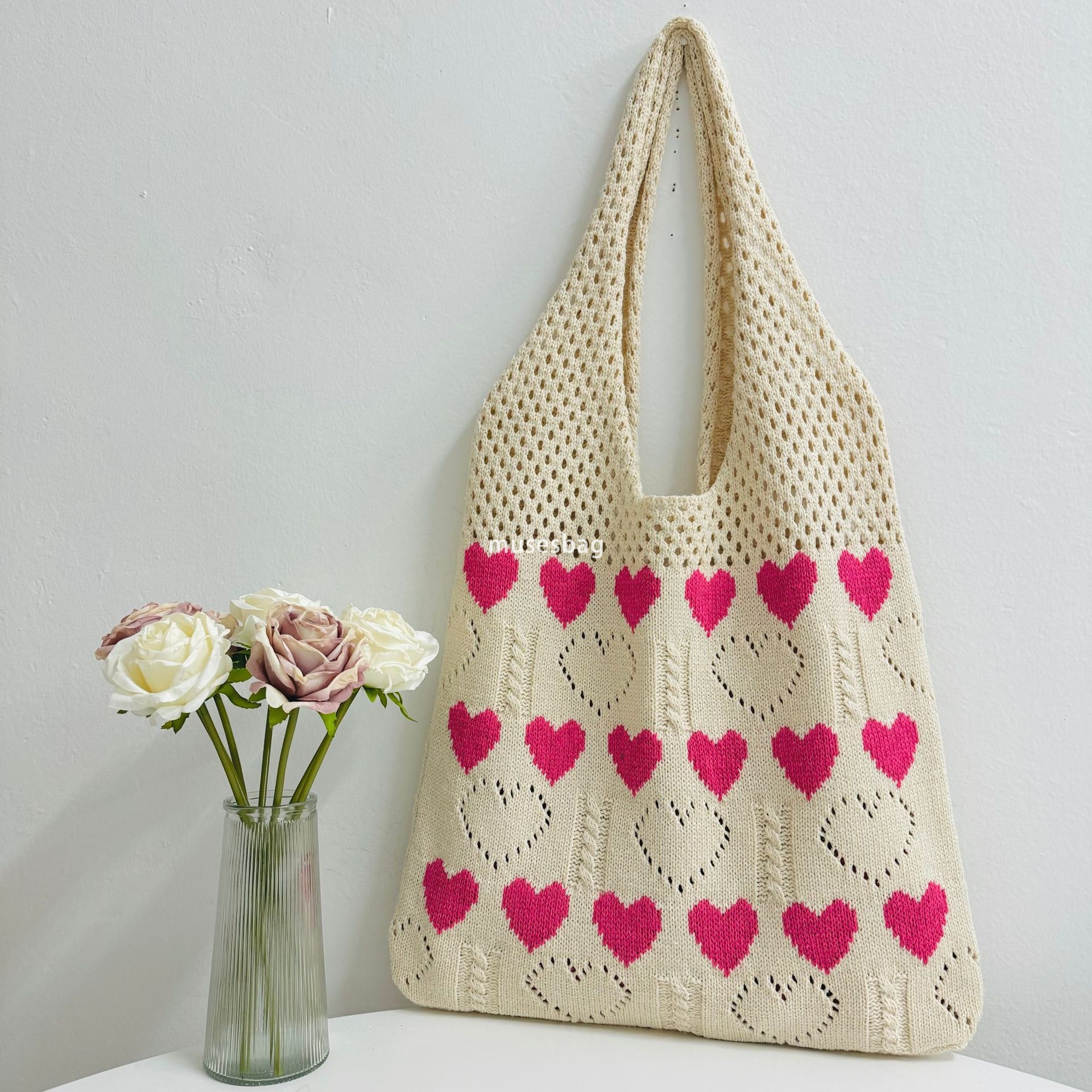 New Instagram hollowed out design bag summer hot selling knitted bag love pattern bag large capacity woven bag beach bag shopping bag