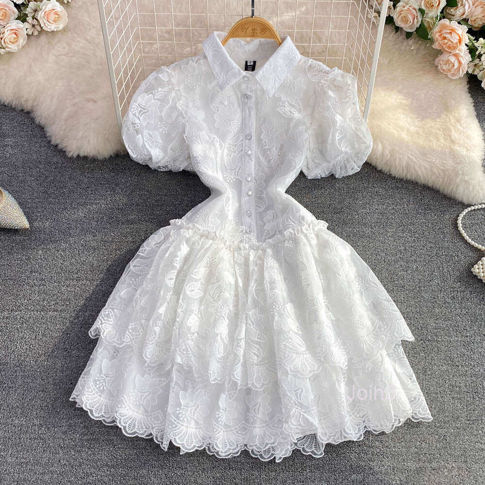 2022 Summer Elegant Fantastic Polo Collar Single breasted White Embroidered Bubble Sleeves A-line Cake Dress for Women