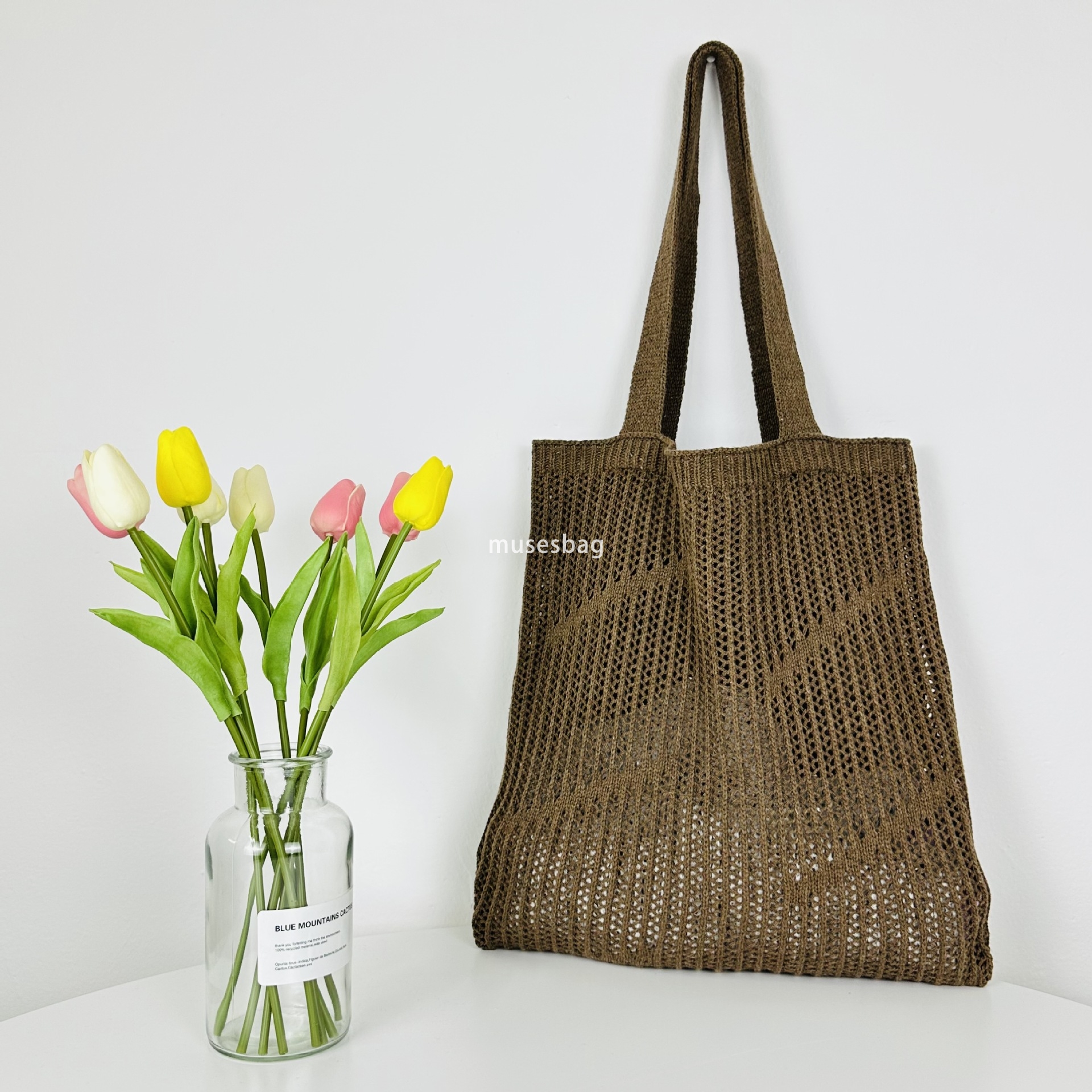 New minimalist and stylish portable bag knitted bag hollowed out bag single shoulder bag large capacity tote bag beach bag women's bag trend