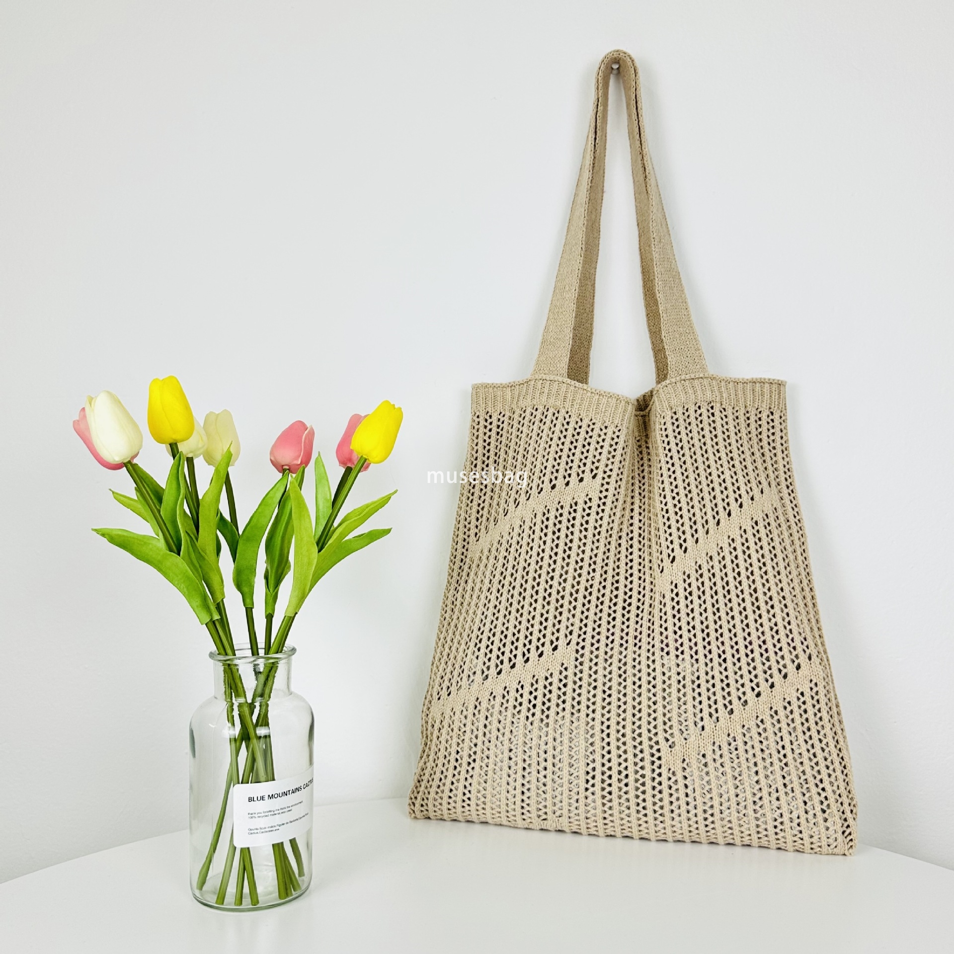 New minimalist and stylish portable bag knitted bag hollowed out bag single shoulder bag large capacity tote bag beach bag women's bag trend