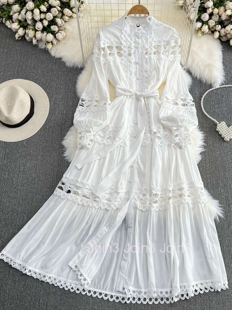 Courtyard style lantern long sleeved standing collar with waistband A-line hollowed out single breasted dress elegant dress long skirt