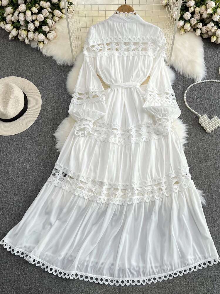 Courtyard style lantern long sleeved standing collar with waistband A-line hollowed out single breasted dress elegant dress long skirt
