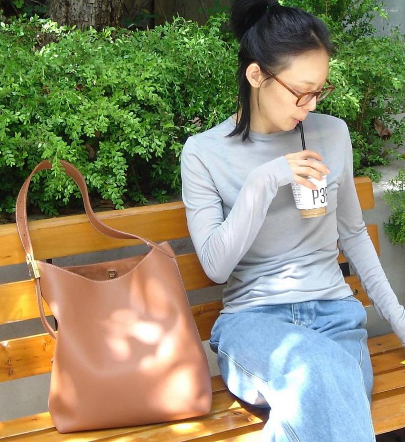 3 Shoulder Bags Elegant Handbag ed With Suede Trendy Touch Showcasing Brand's Master Craftsmanship Classic Engraved Locpacious Bag 4