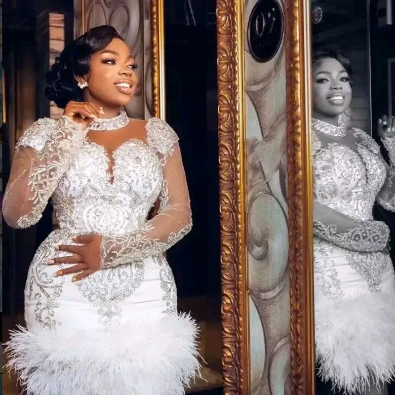 2025 Arabic A Line Wedding Dresses Short Boho High Neck Illusion Silver Crystal Beads Feather Long Sleeves Zipper Back Plus Size Bridal Gowns