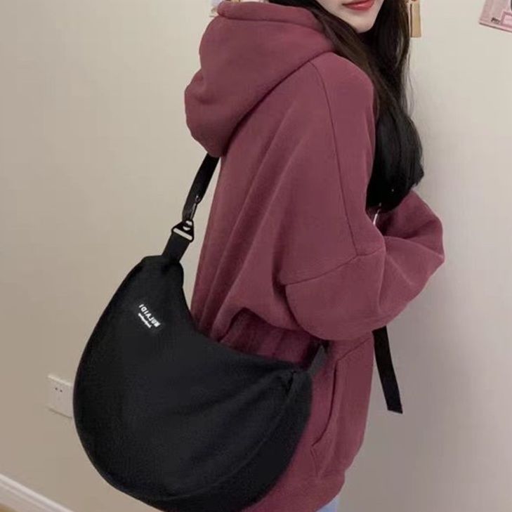 Japanese casual dumplings, sports style crossbody bag, women's large capacity canvas bag, student class one shoulder commuting bag, trendy