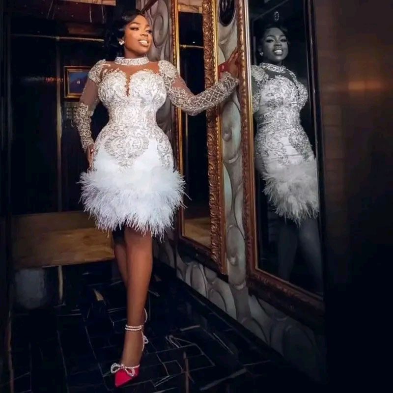 2025 Arabic A Line Wedding Dresses Short Boho High Neck Illusion Silver Crystal Beads Feather Long Sleeves Zipper Back Plus Size Bridal Gowns