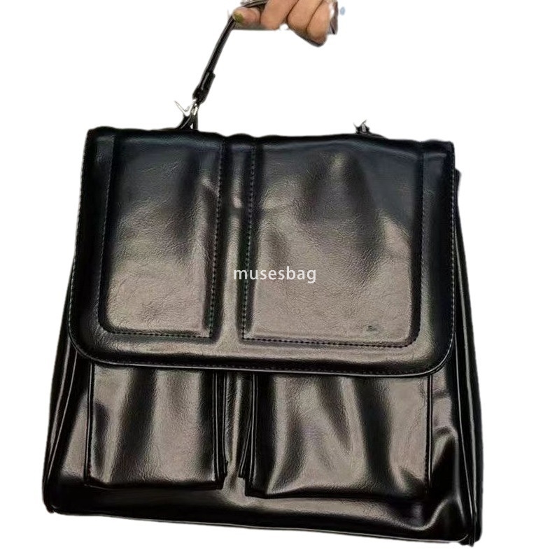 High quality niche design new original student party class commuting milk white backpack versatile diagonal cross bag hand in hand carrying bag