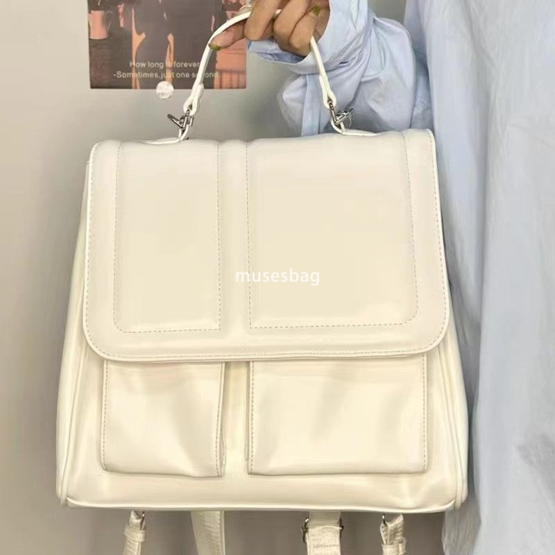 High quality niche design new original student party class commuting milk white backpack versatile diagonal cross bag hand in hand carrying bag