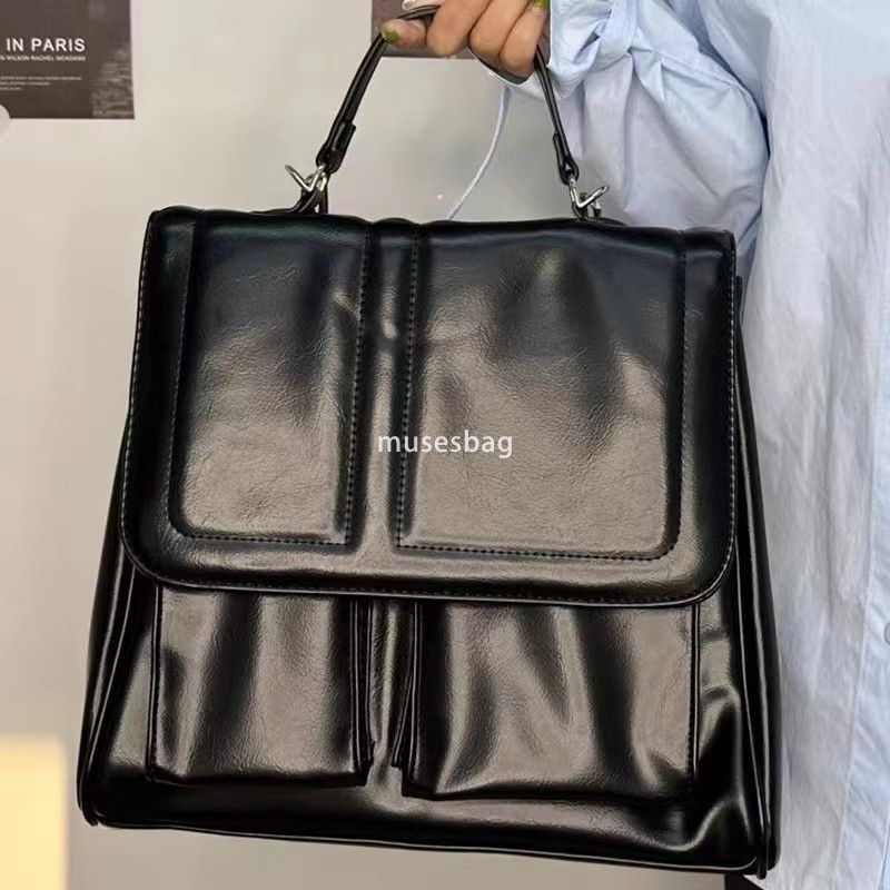 High quality niche design new original student party class commuting milk white backpack versatile diagonal cross bag hand in hand carrying bag